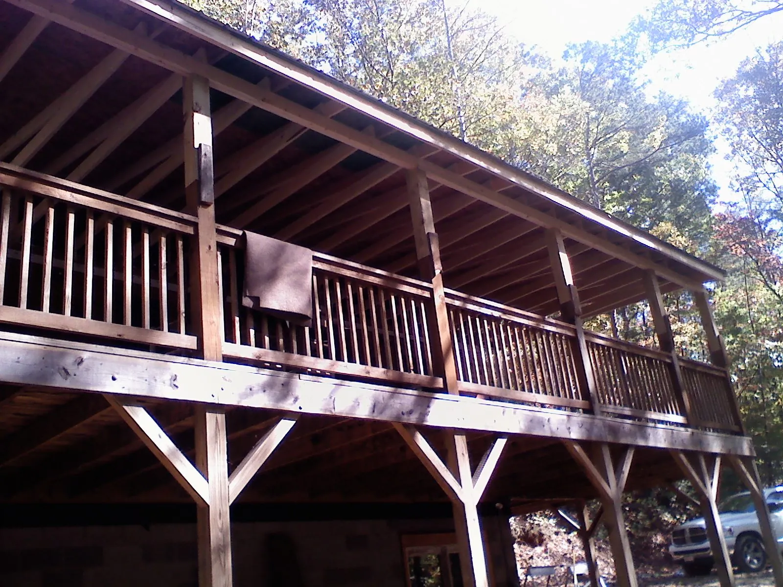 Timber framing under a new elevated porch and deck — Roof Leak Repair in Bulger by Roofing Brothers